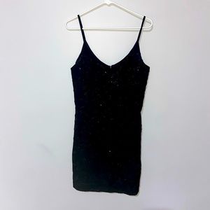 Black mini homecoming/prom dress.